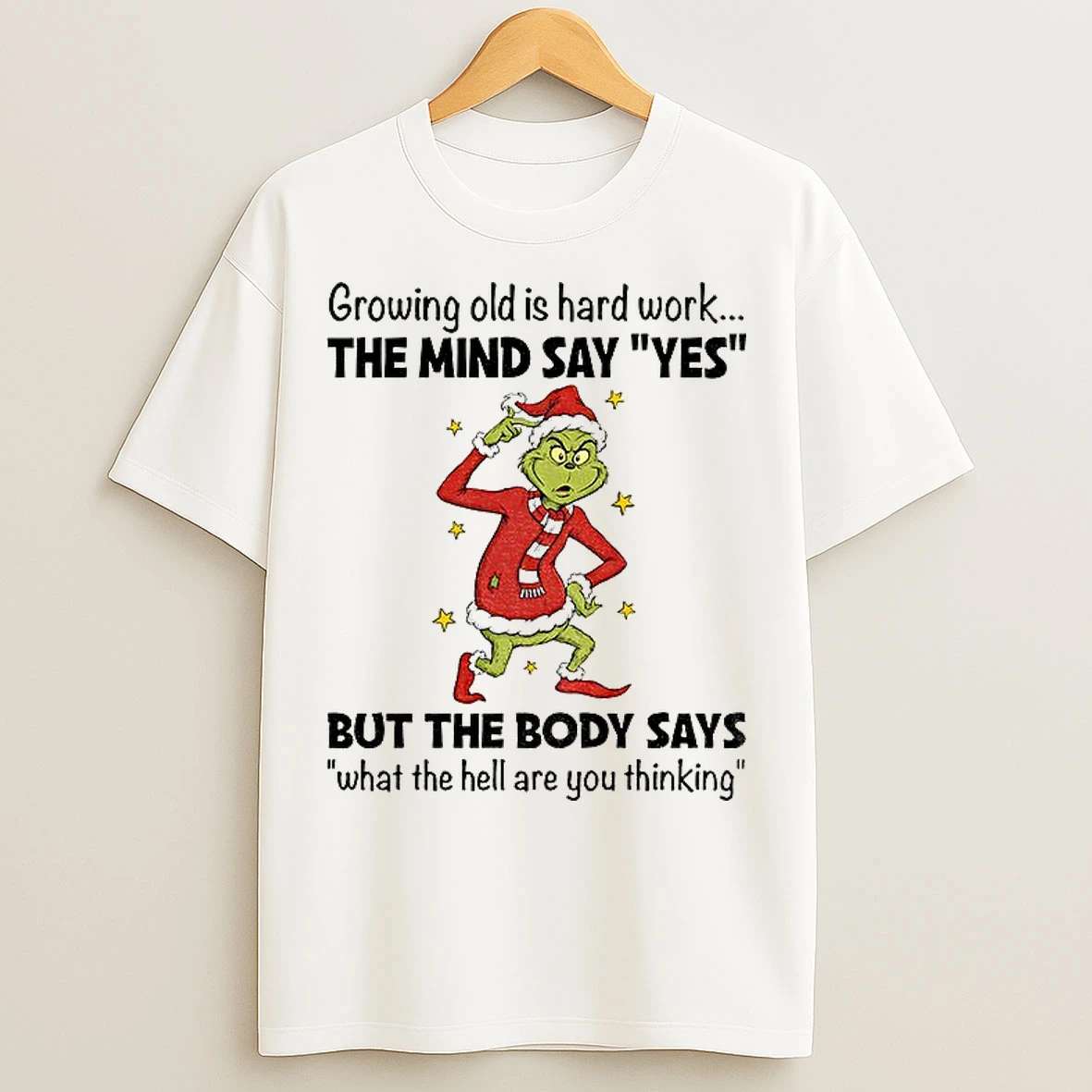 Classic Grinch Santa Hat Growing Old Is Hard Work The Mind Say Yes But The Body Says What The Hell Are You Thinking Christmas T Shirts