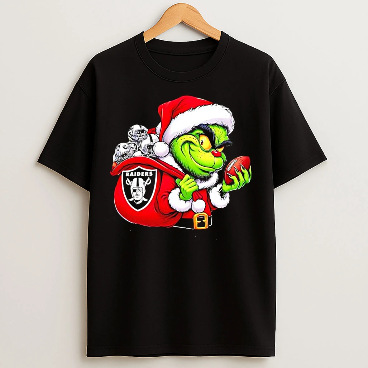 Classic Grinch Holding Las Vegas Raiders Grinchmas T Shirts
