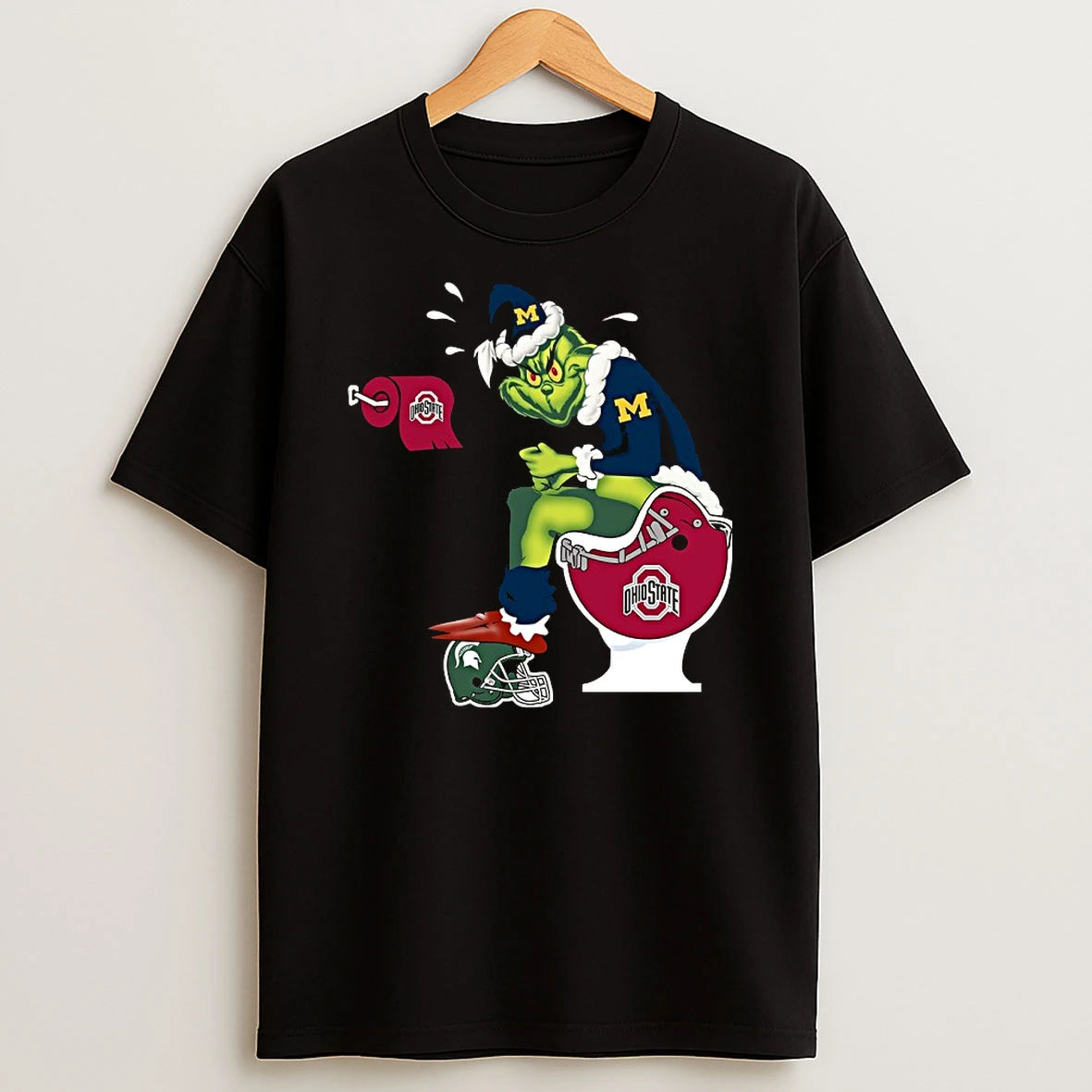 Grinch Michigan Wolverines Shit On Ohio State Buckeyes Helmet Toilet Christmas 2025 Shirts