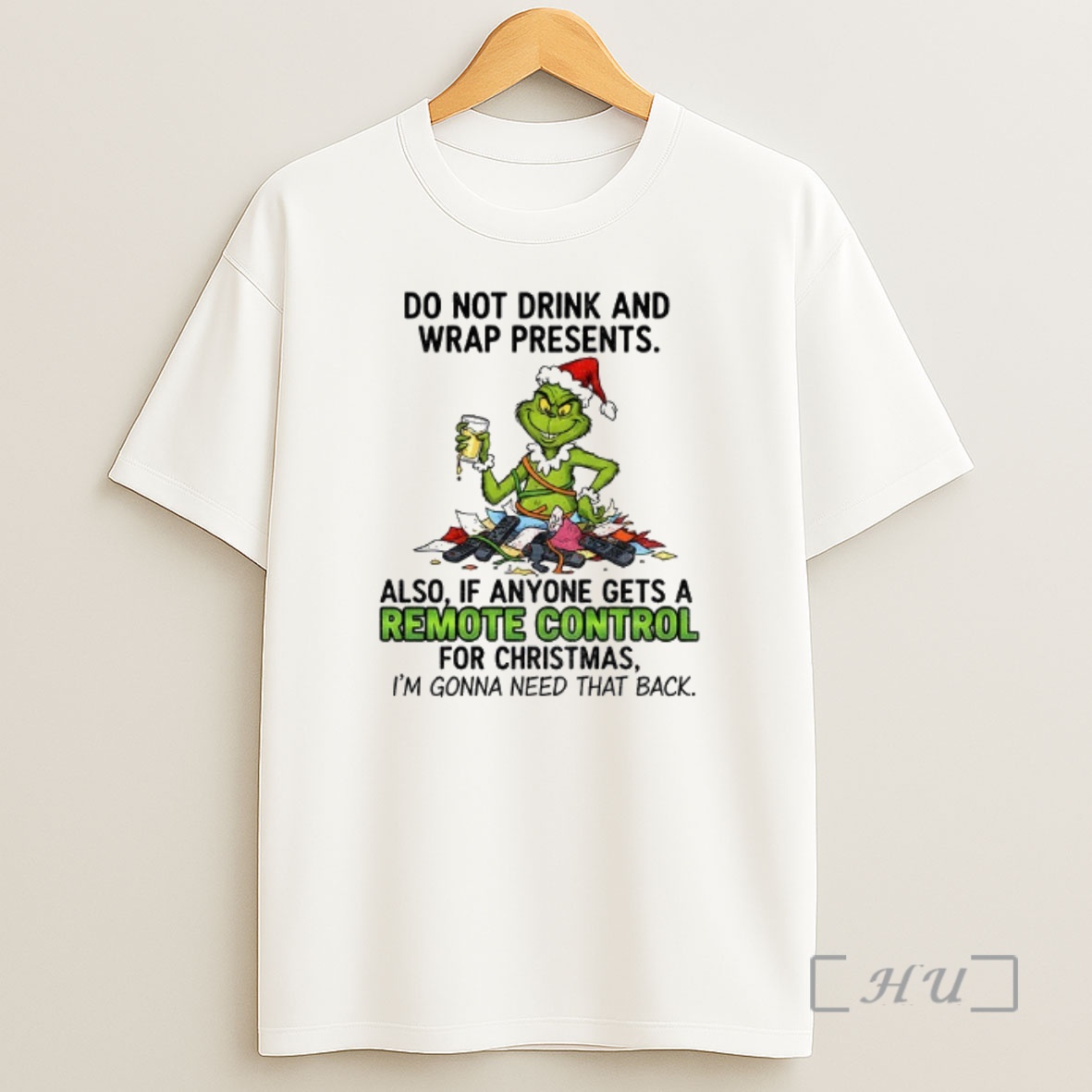 Officials Grinch Santa Hat Do Not Drink And Wrap Presents Also If Anyone Gets A Remote Control Christmas Premium Shirt Sweatshirt Tee