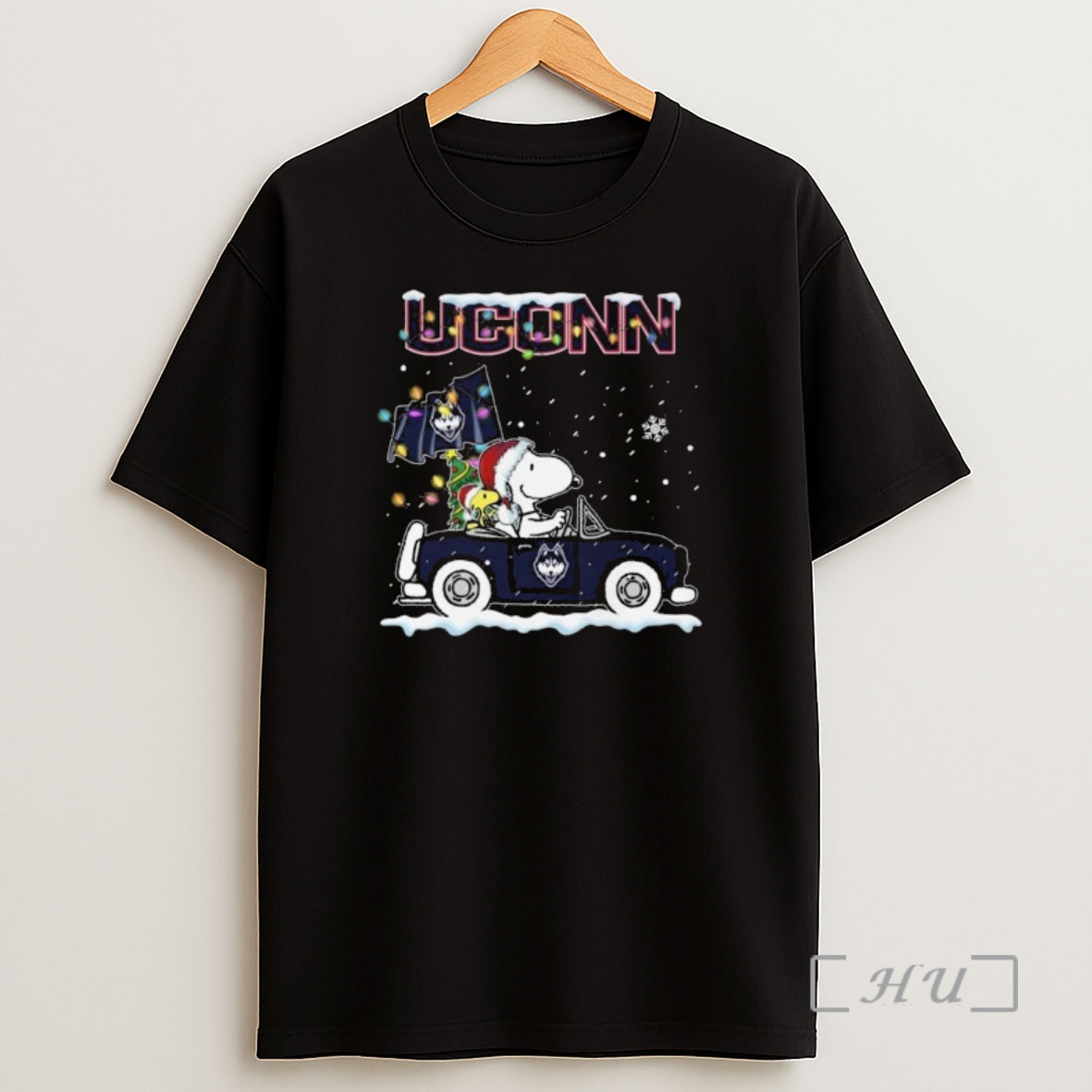 Officials Snoopy And Woodstock Driving Car Uconn Huskies Merry Christmas 2025 Shirt Sweatshirt Tee