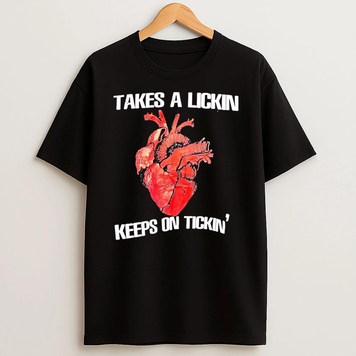 Takes A Lickin Keeps On Tickin Shirts