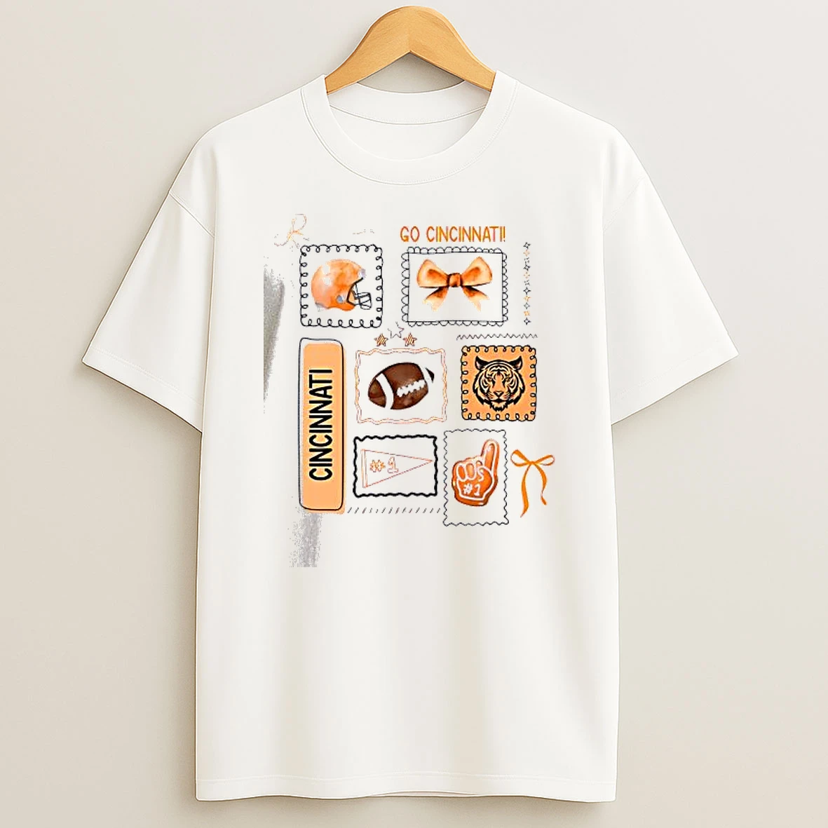 Whatwillwear Dalatshirt 20251210_133224 71_go Cincinnati Football Helmet Bow 1 Fan Graphic Team Spirit Shirts
