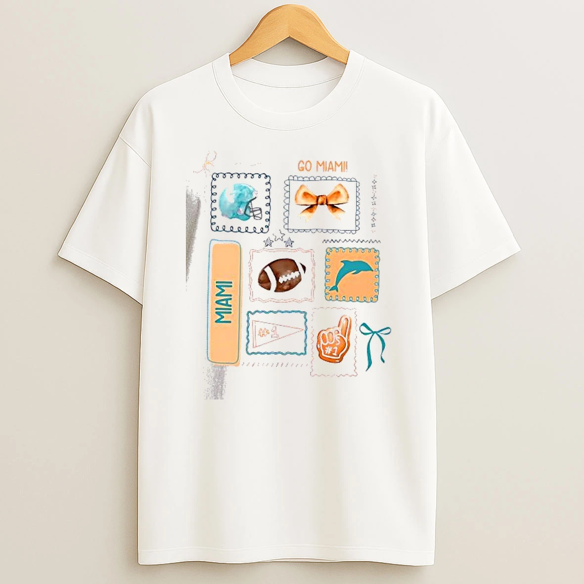 Whatwillwear Dalatshirt 20251210_133224 71_go Miami Football Helmet Bow Dolphin 1 Fan Graphic Team Spirit Shirts