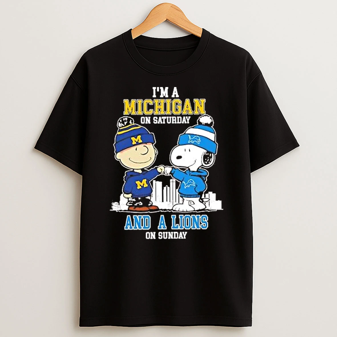 Whatwillwear Hoopoetees 20251219_181129 71_charlie Browns Snoopy Fist Pump Im A Michigan On Saturday Lions On Sunday Shirts