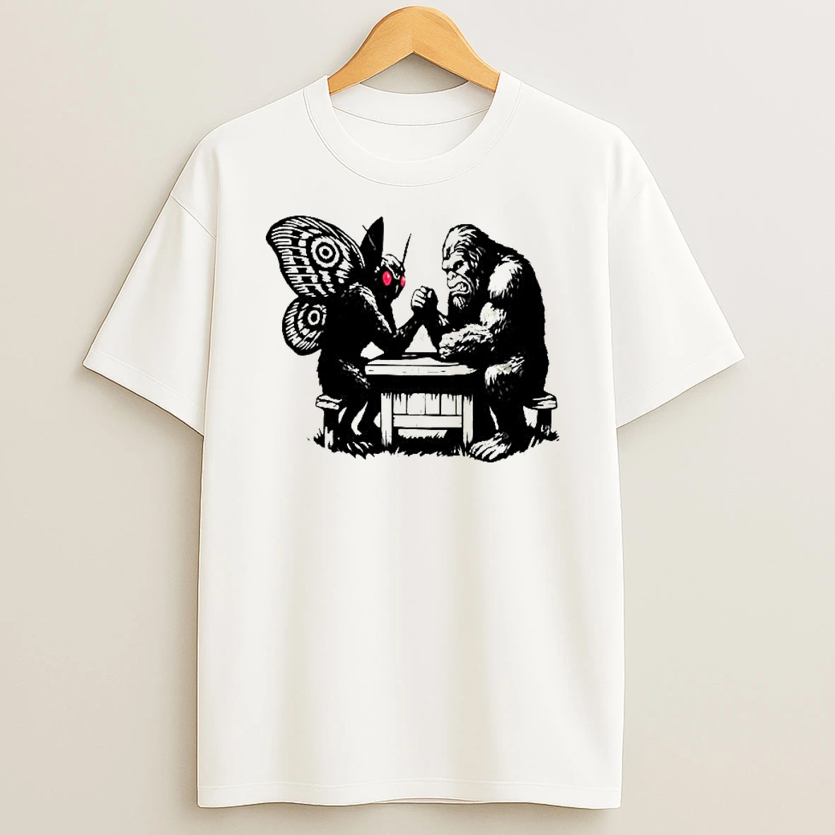 Bigfoot Arm Wrestles With Mothman Woman Shirts