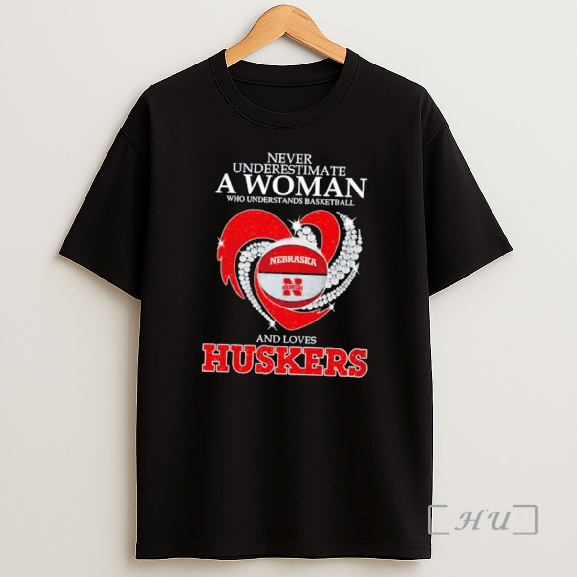 Officials Never Underestimate A Woman Who Understands Basketball Nebraska And Loves Huskers Graphic Shirt Sweatshirt Tee
