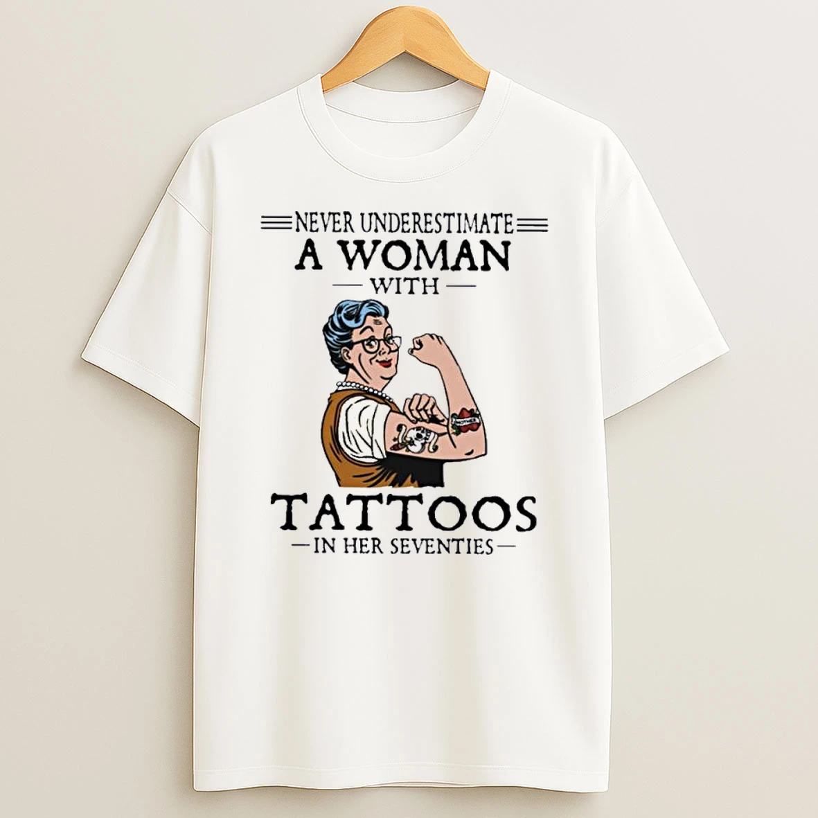 Never Underestimate A Woman With Tattoos In Her Seventies Shirts