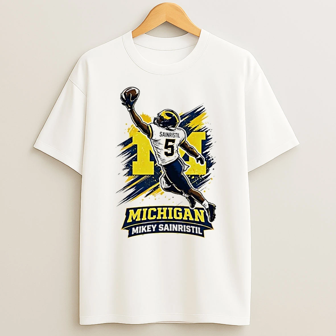 Mikey Sainristil Catching Graphic Michigan Wolverines Shirts